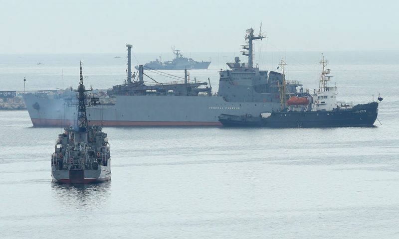 SEVASTOPOL, UKRAINE - MARCH 06: Russian warships stand at the entrance to the main harbour on March 6, 2014 in Sevastopol, Ukraine. The Russian warships are on hand to prevent two Ukrainian warships, the Slavutych and the Ternipol, from eparting as a blockade by Russian-led forces of Ukrainian military facilities and assets continues on Crimea. Earlier in the day the Crimean Parliament voted to secede from Ukraine and join Russia. (Photo by Sean Gallup/Getty Images)