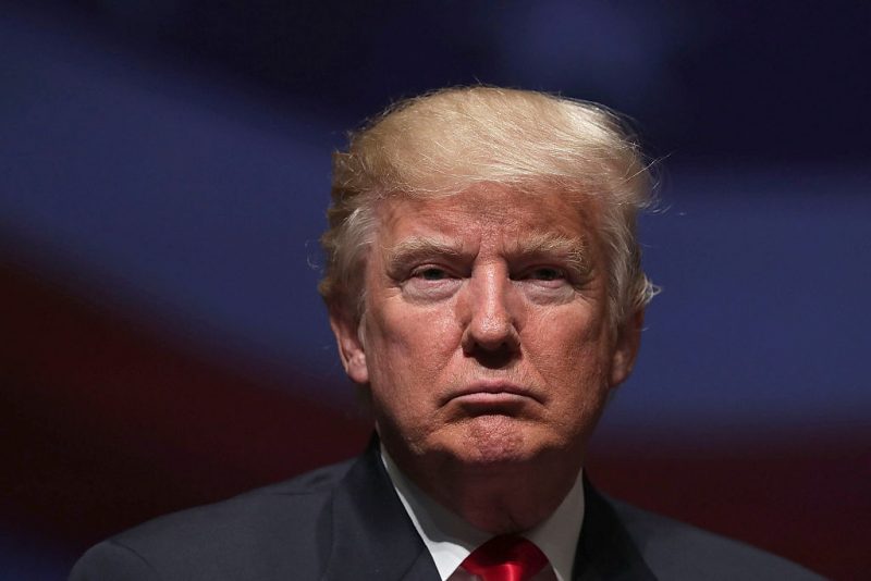 Republican presidential nominee Donald Trump pauses during a campaign event September 6, 2016 in Virginia Beach, Virginia. Trump participated in a discussion with retired Army Lieutenant General Michael Flynn. (Photo by Alex Wong/Getty Images)