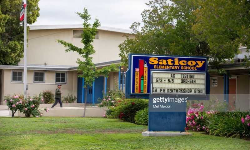 An LGBTQ flag was burned at Saticoy Elementary School in North Hollywood and police are now investigating it as a possible hate crime. Before it was burned, the small flag was displayed in a planter outside of a classroom at the school. This crime comes as the school plans to hold a Pride Day assembly on Friday. (Mel Melcon / Los Angeles Times via Getty Images)