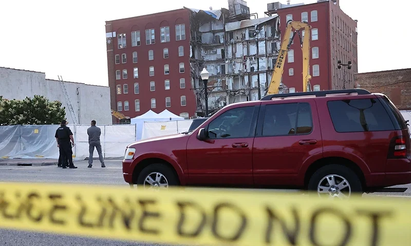 DAVENPORT, IOWA - JUNE 04: Search and rescue effort continue at a six-story apartment building nearly a week after a section of the building collapsed on June 4, 2023 in Davenport, Iowa. Demolition of the building was scheduled to begin last week, but community members protested what they felt was the lack of effort searching for still-missing residents and the demolition was delayed. Three people who lived in the building remain unaccounted for. (Photo by Scott Olson/Getty Images)