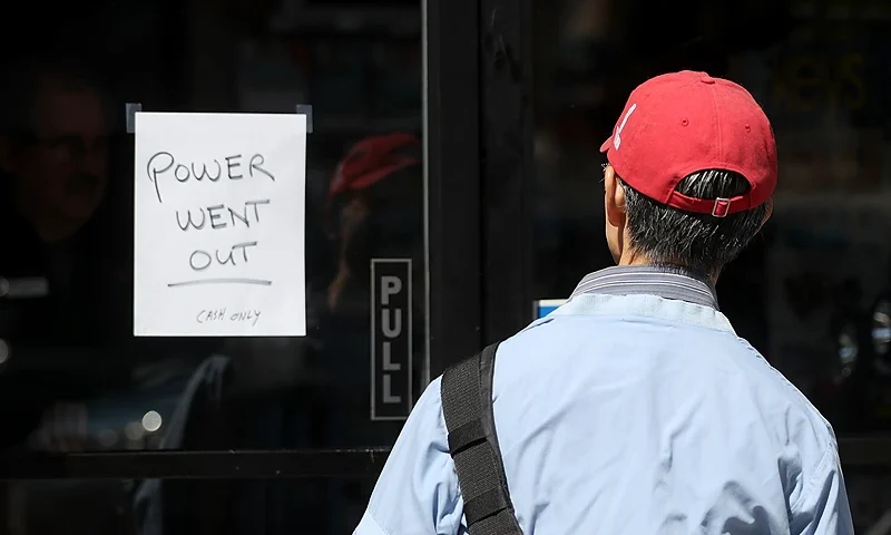 AUSTIN, TX - FEBRUARY 17, 2021: A sign states that a Fiesta Mart is closed because of a power outage in Austin, Texas on February 17, 2021. Millions of Texans are still without water and electric as winter storms continue. (Photo by Montinique Monroe/Getty Images)