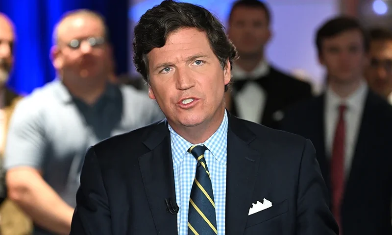 HOLLYWOOD, FLORIDA - NOVEMBER 17: Tucker Carlson speaks during 2022 FOX Nation Patriot Awards at Hard Rock Live at Seminole Hard Rock Hotel & Casino Hollywood on November 17, 2022 in Hollywood, Florida. (Photo by Jason Koerner/Getty Images)