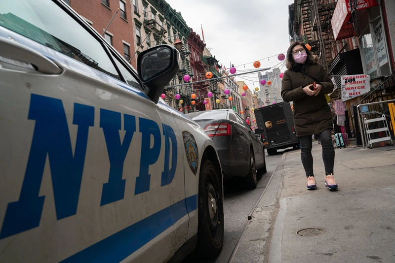 NEW YORK, NEW YORK - MARCH 17: NYPD officers step up patrols in Asian communities after mass shootings in Atlanta that left 8 dead, including 6 Asian Americans, on March 17, 2021 in New York City. Stop AAPI Hate a nonprofit social organization that tracks incidents of discrimination, hate and xenophobia against Asian Americans said it recorded 3,795 anti-Asian hate incidents between March 19, 2020 and February 28, 2021. (Photo by David Dee Delgado/Getty Images)