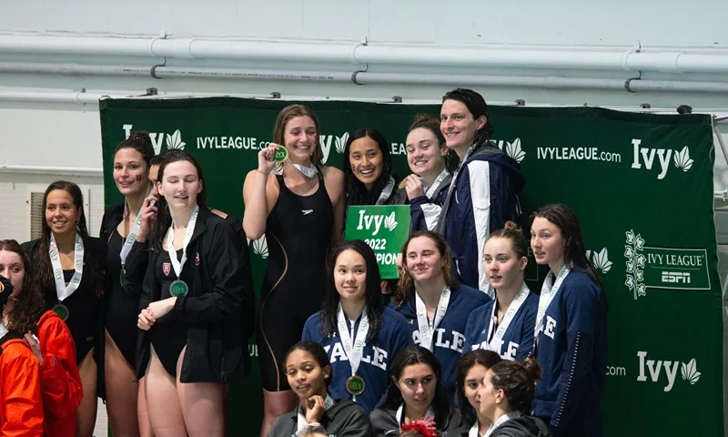 CAMBRIDGE, MA - FEBRUARY 19: University of Pennsylvania swimmer Lia Thomas poses with her teammates Hannah Kannan, Camryn Carter, and Margot Kaczorowski after winning the 400 yard freestyle relay during the 2022 Ivy League Womens Swimming and Diving Championships at Blodgett Pool on February 19, 2022 in Cambridge, Massachusetts. (Photo by Kathryn Riley/Getty Images)