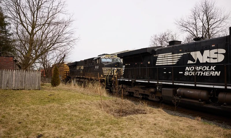 EAST PALESTINE, OH - FEBRUARY 14: A Norfolk Southern train is en route on February 14, 2023 in East Palestine, Ohio. Another train operated by the company derailed on February 3, releasing toxic fumes and forcing evacuation of residents. (Photo by Angelo Merendino/Getty Images)