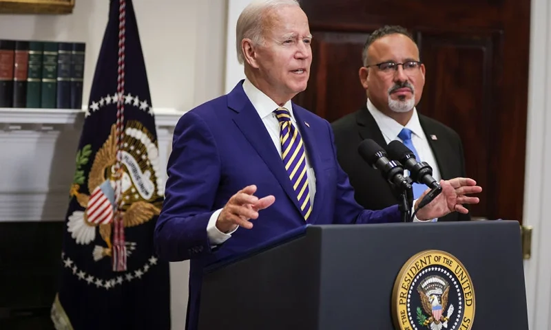 WASHINGTON, DC - AUGUST 24: U.S. President Joe Biden, joined by Education Secretary Miguel Cardona, speaks on student loan debt in the Roosevelt Room of the White House August 24, 2022 in Washington, DC. President Biden announced steps to forgive $10,000 in student loan debt for borrowers who make less than $125,000 per year and cap payments at 5 percent of monthly income. (Photo by Alex Wong/Getty Images)