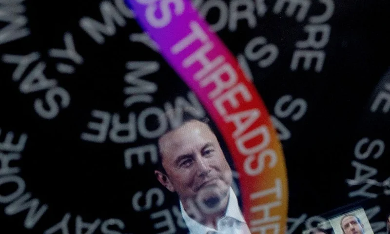 This photo illustration created in Washington, DC, on July 6, 2023, shows an image of Elon Musk and Meta CEO Mark Zuckerberg reflected in the opening page of Threads, an Instagram app. Twitter threatened to sue Meta just hours after the Instagram parent company launched Threads, an app it hopes will beat out the struggling site owned by Elon Musk. In a letter to Meta CEO Mark Zuckerberg, published by online news outlet Semafor on July 6, 2023, Musk lawyer Alex Spiro accused the company of "unlawful misappropriation of Twitter's trade secrets and other intellectual property." (Photo by Stefani REYNOLDS / AFP) (Photo by STEFANI REYNOLDS/AFP via Getty Images)