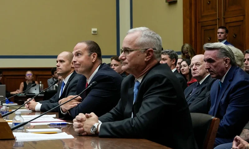 WASHINGTON, DC - JULY 26: (L-R) Ryan Graves, executive director of Americans for Safe Aerospace, David Grusch, former National Reconnaissance Officer Representative of Unidentified Anomalous Phenomena Task Force at the U.S. Department of Defense, and Retired Navy Commander David Fravor testify during a House Oversight Committee hearing titled "Unidentified Anomalous Phenomena: Implications on National Security, Public Safety, and Government Transparency" on Capitol Hill 26, 2023 in Washington, DC. Several witnesses are testifying about their experience with possible UFO encounters and discussion about a potential covert government program concerning debris from crashed, non-human origin spacecraft. (Photo by Drew Angerer/Getty Images)