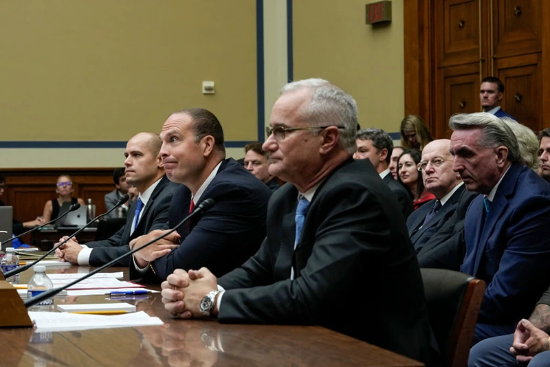 WASHINGTON, DC - JULY 26: (L-R) Ryan Graves, executive director of Americans for Safe Aerospace, David Grusch, former National Reconnaissance Officer Representative of Unidentified Anomalous Phenomena Task Force at the U.S. Department of Defense, and Retired Navy Commander David Fravor testify during a House Oversight Committee hearing titled "Unidentified Anomalous Phenomena: Implications on National Security, Public Safety, and Government Transparency" on Capitol Hill 26, 2023 in Washington, DC. Several witnesses are testifying about their experience with possible UFO encounters and discussion about a potential covert government program concerning debris from crashed, non-human origin spacecraft. (Photo by Drew Angerer/Getty Images)