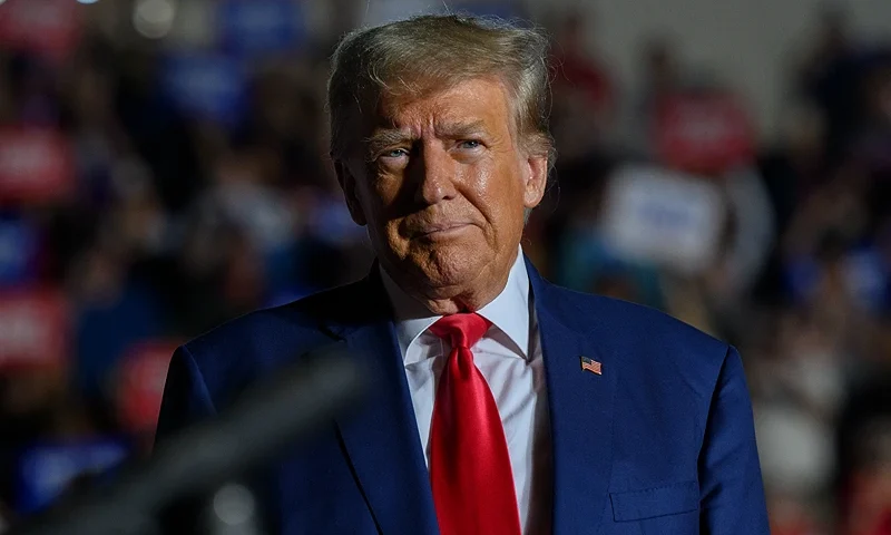 ERIE, PENNSYLVANIA - JULY 29: Former U.S. President Donald Trump enters Erie Insurance Arena for a political rally while campaigning for the GOP nomination in the 2024 election on July 29, 2023 in Erie, Pennsylvania. (Photo by Jeff Swensen/Getty Images)