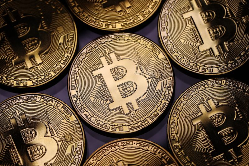 LONDON, ENGLAND - DECEMBER 07: A visual representation of the digital Cryptocurrency, Bitcoin on December 07, 2017 in London, England. Cryptocurrencies including Bitcoin, Ethereum, and Lightcoin have seen unprecedented growth in 2017, despite remaining extremely volatile. While digital currencies across the board have divided opinion between financial institutions, and now have a market cap of around 175 Billion USD, the crypto sector coninues to grow, as it continues to see wider mainstreem adoption. The price of one Bitcoin passed 15,000 USD across many exchanges today taking it higher than previous all time highs. (Photo by Dan Kitwood/Getty Images)