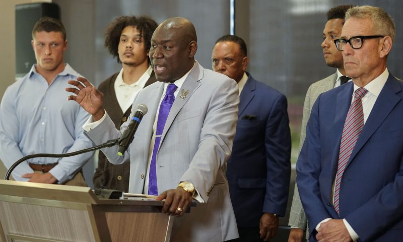 FILE - Standing with former Northwestern athletes, attorney Ben Crump speaks during a press conference addressing widespread hazing accusations at Northwestern University Wednesday, July 19, 2023, in Chicago. Crump was set Monday, July 24, 2023, to announce another lawsuit against Northwestern University over hazing allegations in its athletic programs, with the latest suit touted as containing “damning new details” of sexual hazing and abuse in its football program. (AP Photo/Erin Hooley, File)