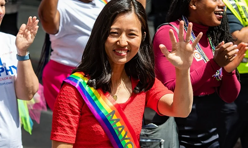 Boston Mayor Michelle Wu waves while marching in the Pride Parade in Boston, Massachusetts, on June 10, 2023. The parade, the first to be organized by Boston Pride for the People, features 10,000 participants and is the first pride parade in Boston since 2019. (Photo by Joseph Prezioso / AFP) (Photo by JOSEPH PREZIOSO/AFP via Getty Images)