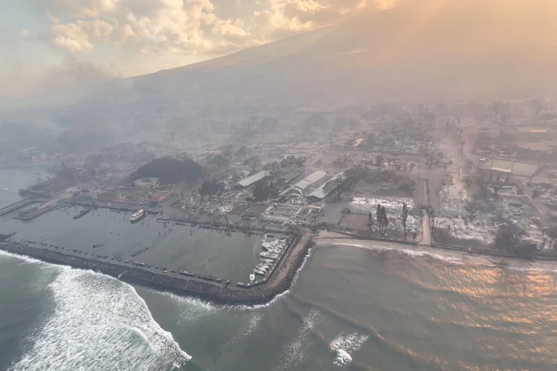 An aerial view of damaged areas amidst wildfires in Maui, Hawaii, U.S., August 9, 2023, in this screenshot taken from a social media video. Vince Carter/via REUTERS