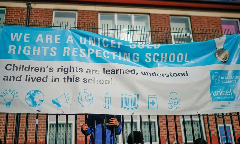 BIRMINGHAM, ENGLAND - MARCH 21: Parents, children and protestors demonstrate against the 'No Outsiders' programme, which teaches children about LGBT rights, at Parkfield Community School on March 21, 2019 in Birmingham, England. on March 21, 2019 in Birmingham, England. The School had agreed with parents to stop teaching the No Outsiders programme, where pupils learnt about LGBT relationships and rights, but parents discovered that it was still being taught and are protesting against the school's leadership. Parents believe a new programme should be negotiated with them that complies with the Equality Act 2012. (Photo by Christopher Furlong/Getty Images)