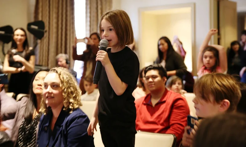 LOS ANGELES, CALIFORNIA - JANUARY 24: A child asks a question during the "Sonic The Hedgehog" Parent Blogger / Influencer Conference featuring James Marsden, Ben Schwartz & Jim Carrey with host Heather Brooker at the Four Seasons Los Angeles at Beverly Hills on January 24, 2020 in Los Angeles, California. (Photo by Rachel Murray/Getty Images for Paramount Pictures)