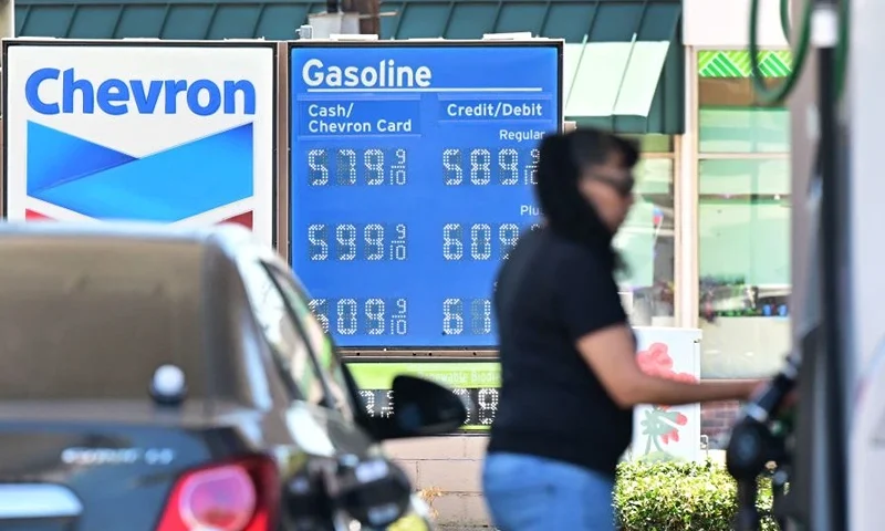 Gas prices are displayed at a petrol station in Monterey Park, California, on July 19, 2022. - US gasoline prices have fallen from historic highs earlier in the summer, a retreat highlighted by a politically beset White House as a sign of moderating inflation. President Joe Biden took to Twitter to point out that prices at the pump have fallen for more than a month, saving the average driver about $25 a month. Gasoline prices are now at a national average of $4.495 per gallon, down 10 percent from a month ago but up 42 percent from the year-ago level, according to the American Automobile Association. (Photo by Frederic J. BROWN / AFP) (Photo by FREDERIC J. BROWN/AFP via Getty Images)