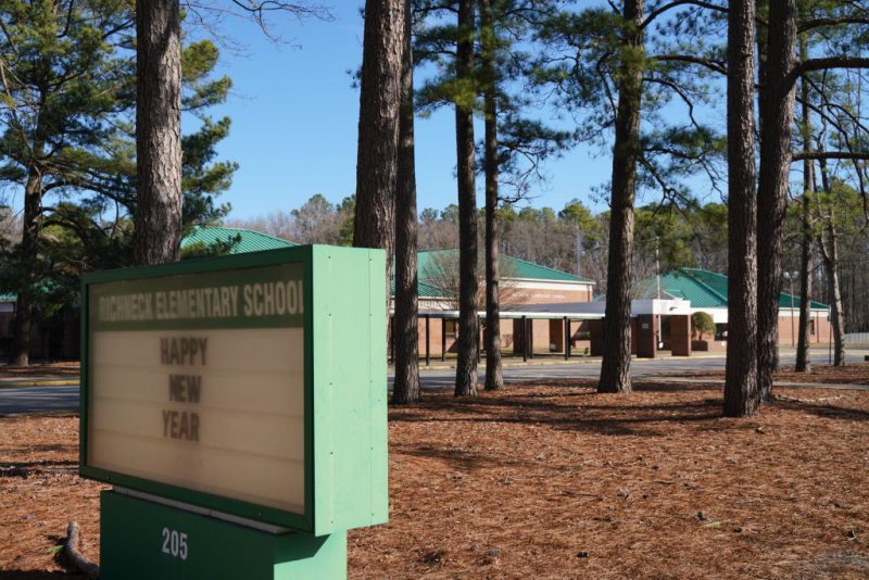 NEWPORT NEWS, VA - JANUARY 07: A school sign wishing students a "Happy New Year" is seen outside Richneck Elementary School on January 7, 2023 in Newport News, Virginia. A 6-year-old student was taken into custody after reportedly shooting a teacher during an altercation in a classroom at Richneck Elementary School on Friday. The teacher, a woman in her 30s, suffered “life-threatening” injuries and remains in critical condition, according to police reports. (Photo by Jay Paul/Getty Images)