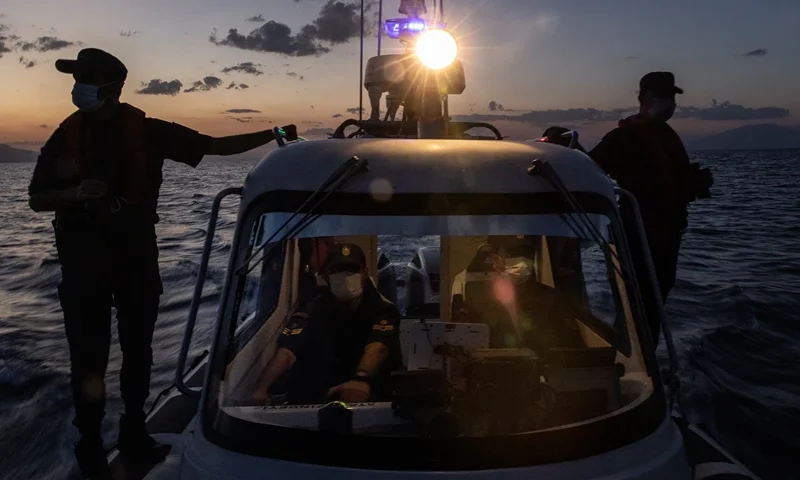 Turkey Toughens Iranian Border Security In Response To Afghan Migrant Wave VAN, TURKEY - SEPTEMBER 29: Members of the Turkish Coast Guard search for boats carrying refugees and migrants during a patrol conducted for the press on Lake Van on September 29, 2021 in Van, Turkey. Since the U.S. pull-out from Afghanistan and the Taliban taking control of the country, Turkey has seen a steady rise in Afghan migrants entering the country illegally via a centuries-old smuggling route through Iran. To halt the flow of refugees and migrants, Turkey's law enforcement agencies have increased security along its border and taken new measures to effectively close the border to illegal migrants. "The world has to know that our borders are closed to any migrant influx," said Mehmet Emin Bilmez, governor of the eastern border province of Van. Over the past three months, construction has increased on the 230km Iran border wall which was started in 2017, as trenches, barbed wire and 24hr border security patrols have been implemented, drones have been deployed to monitor border areas and more than 6000 additional soldiers, Jandarma and police have been added to reinforce border areas and to monitor well known smuggler routes. Turkey’s President Tayyip Erdogan recently urged European countries to step up and take responsibility in the event of a new refugee influx, stating that Turkey would not become "Europe's migrant storage unit". Turkey currently hosts more than 4.4 million refugees and migrants and has called on the international community and the United Nations to assist with any further influx. (Photo by Chris McGrath/Getty Images)