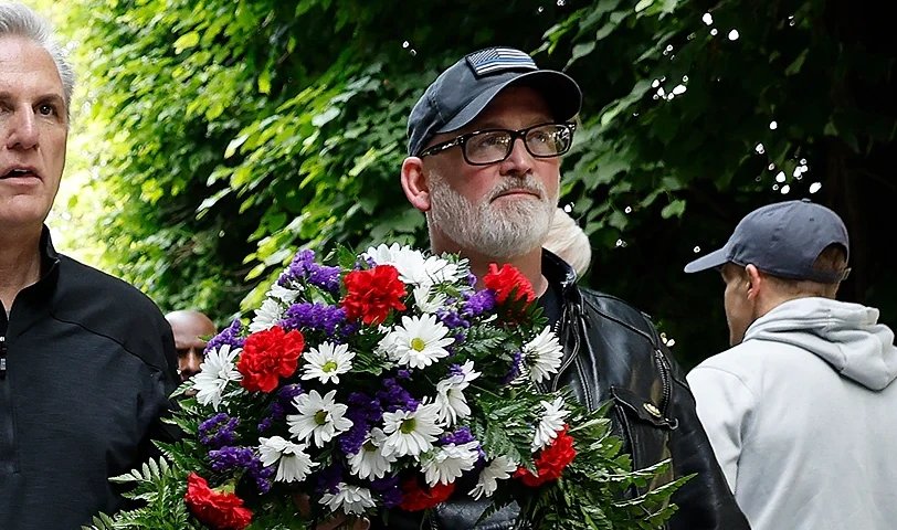 WASHINGTON, DC - MAY 11: Speaker of the House Kevin McCarthy (R-CA) (L) joins Rep. Derrick Van Orden (R-WI) as they lay a wreath in honor of U.S. Border Patrol Agent Raul Gonzalez at The National Law Enforcement Officers Memorial on May 11, 2023 in Washington, DC. Ahead of National Police Week, McCarthy hosted his third annual Back the Blue Bike Tour and joined Republican members of Congress and law enforcement officers at the memorial to lay wreaths in honor of officers who died in the last year. (Photo by Chip Somodevilla/Getty Images)