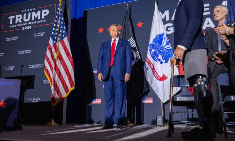 : Former U.S. President Donald Trump on stage before delivering remarks at Windham High School on August 8, 2023 in Windham, New Hampshire. This is the fourth visit that former President Trump has made to New Hampshire this campaign season. (Photo by Scott Eisen/Getty Images)