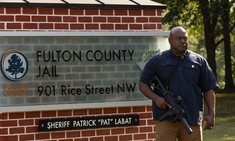 Security outside the Fulton County Jail ahead of former President Donald Trump's expected arrival on August 24, 2023, in Atlanta, Georgia. Former US President Donald Trump and 18 others were given until August 25, 2023 to surrender at the courthouse after being indicted on 41 counts related to their efforts to overturn the 2020 US Presidential election. (Photo by Christian MONTERROSA / AFP) (Photo by CHRISTIAN MONTERROSA/AFP via Getty Images)