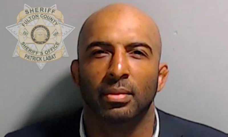 Defendants In State Of Georgia V. Trump Case To Be Booked Through Fulton County Jail ATLANTA, GEORGIA - AUGUST 24: In this handout provided by the Fulton County Sheriff's Office, leader of Black Voices for Trump Floyd Harrison poses for his booking photo on August 24, 2023 in Atlanta, Georgia. Former President Donald Trump and 18 others facing felony charges in the indictment related to tampering with the 2020 election in Georgia have been ordered to turn themselves in by August 25. (Photo by Fulton County Sheriff's Office via Getty Images)