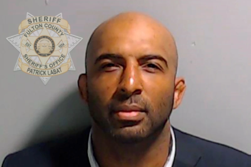 Defendants In State Of Georgia V. Trump Case To Be Booked Through Fulton County Jail
ATLANTA, GEORGIA - AUGUST 24: In this handout provided by the Fulton County Sheriff's Office, leader of Black Voices for Trump Floyd Harrison poses for his booking photo on August 24, 2023 in Atlanta, Georgia. Former President Donald Trump and 18 others facing felony charges in the indictment related to tampering with the 2020 election in Georgia have been ordered to turn themselves in by August 25. (Photo by Fulton County Sheriff's Office via Getty Images)