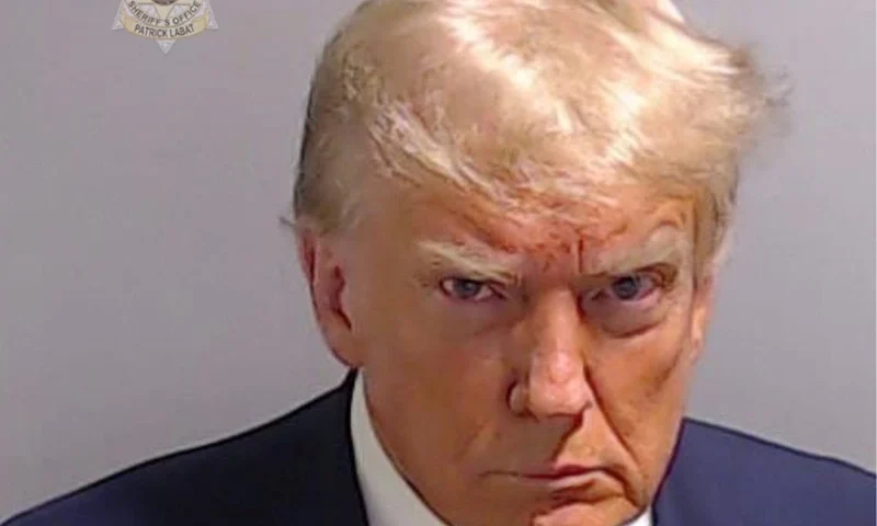 ATLANTA, GEORGIA - AUGUST 24: In this handout provided by the Fulton County Sheriff's Office, former U.S. President Donald Trump poses for his booking photo at the Fulton County Jail on August 24, 2023 in Atlanta, Georgia. Trump was booked on 13 charges related to an alleged plan to overturn the results of the 2020 presidential election in Georgia. Trump and 18 others facing felony charges have been ordered to turn themselves in to the Fulton County Jail by August 25. (Photo by Fulton County Sheriff's Office via Getty Images)