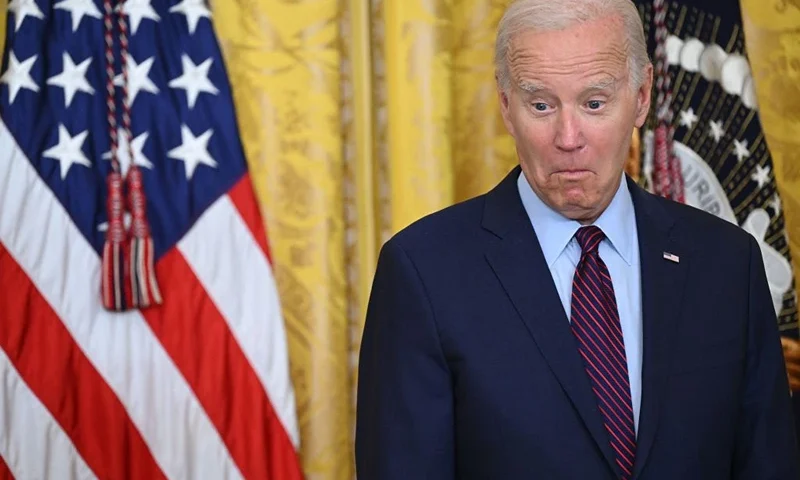 US President Joe Biden reacts as he hosts a reception to commemorate the 60th Anniversary of the founding of the Lawyers' Committee for Civil Rights Under Law, in the East Room of the White House in Washington, DC, on August 28, 2023. (Photo by SAUL LOEB / AFP) (Photo by SAUL LOEB/AFP via Getty Images)