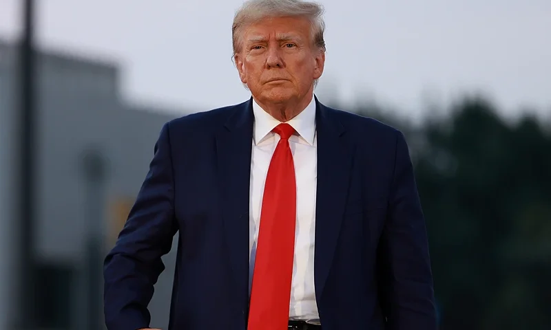 ATLANTA, GEORGIA - AUGUST 24: Former U.S. President Donald Trump arrives to depart at Atlanta Hartsfield-Jackson International Airport after being booked at the Fulton County jail on August 24, 2023 in Atlanta, Georgia. Trump was booked on multiple charges related to an alleged plan to overturn the results of the 2020 presidential election in Georgia. (Photo by Joe Raedle/Getty Images)