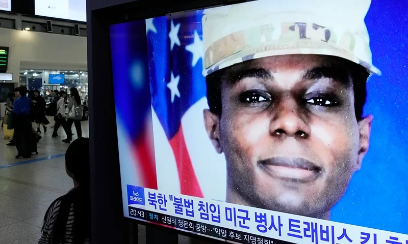 A TV screen shows a file image of American soldier Travis King during a news program at the Seoul Railway Station in Seoul, South Korea, Wednesday, Sept. 27, 2023. North Korea said Wednesday that it will expel King who crossed into the country through the heavily armed border between the Koreas in July. (AP Photo/Ahn Young-joon)