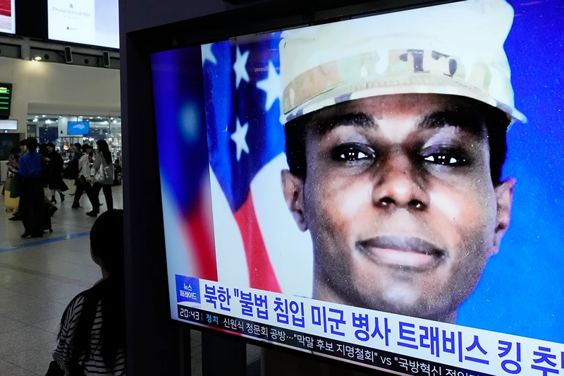 A TV screen shows a file image of American soldier Travis King during a news program at the Seoul Railway Station in Seoul, South Korea, Wednesday, Sept. 27, 2023. North Korea said Wednesday that it will expel King who crossed into the country through the heavily armed border between the Koreas in July. (AP Photo/Ahn Young-joon)