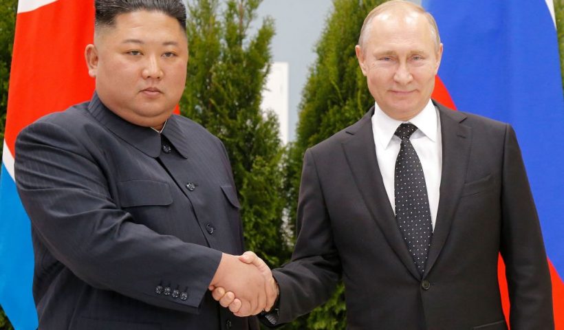TOPSHOT - Russian President Vladimir Putin and North Korean leader Kim Jong Un shake hands as they pose for pictures prior to their talks at the Far Eastern Federal University campus on Russky island in the far-eastern Russian port of Vladivostok on April 25, 2019. (Photo by Alexander Zemlianichenko / POOL / AFP) (Photo by ALEXANDER ZEMLIANICHENKO/POOL/AFP via Getty Images)