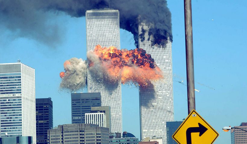 394261 14: A fiery blasts rocks the World Trade Center after being hit by two planes September 11, 2001 in New York City. (Photo by Spencer Platt/Getty Images)