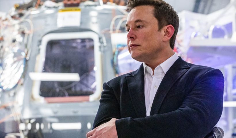 SpaceX founder Elon Musk addresses members of the media during a press conference announcing new developments of the Crew Dragon reusable spacecraft, at SpaceX headquarters in Hawthorne, California on October 10, 2019. (Photo by Philip Pacheco / AFP) (Photo by PHILIP PACHECO/AFP via Getty Images)