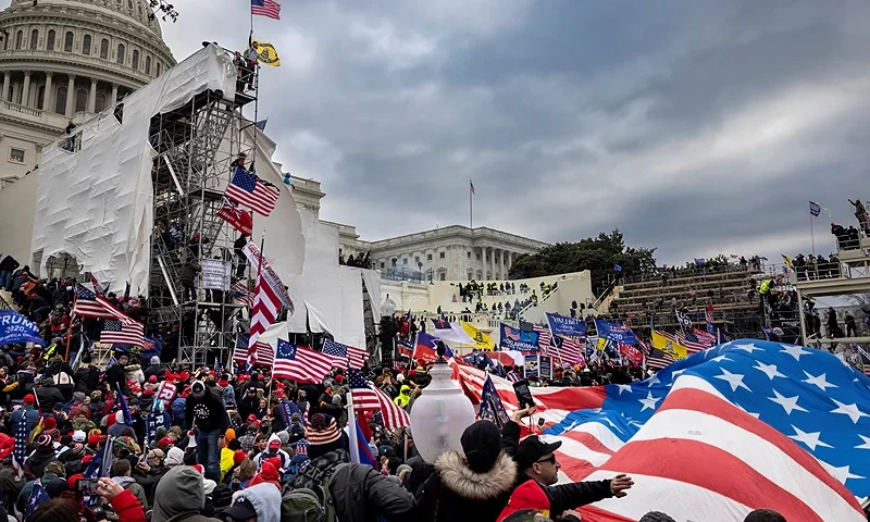 WASHINGTON, DC - JANUARY 6: Trump supporters clash with police and security forces as people try to storm the US Capitol on January 6, 2021 in Washington, DC. Demonstrators breeched security and entered the Capitol as Congress debated the 2020 presidential election Electoral Vote Certification. (photo by Brent Stirton/Getty Images)