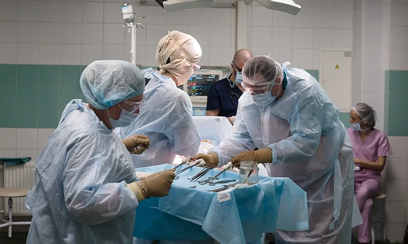 KYIV, UKRAINE - MARCH 30: Doctors and nurses perform a caesarian on Elyzaveta in the maternity hospital on March 30, 2022 in Kyiv area, Ukraine. An estimated half of greater Kyiv's 3.5 million people have fled since the start of Russia's invasion, the capital's mayor said earlier this month. (Photo by Anastasia Vlasova/Getty Images)