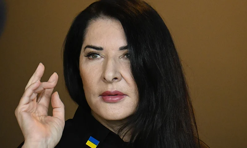 Serbian artist Marina Abramovic poses for the media after a news conference on her latest work titled "7 Deaths of Maria Callas" at the Deutsche Oper opera house in Berlin, Germany, on April 6, 2022. - The opera project by Abramovic will premiere on April 8, 2022. According to Deutsche Oper, "Abramovi? herself appears on stage at the end, fusing performance with the real-life death of Callas. In 7 DEATHS OF MARIA CALLAS the Serbian artist deconstructs opera, placing it in relation to performance art both as her personal tribute to one of the greatest singers of the modern age and as a snapshot of a life devoted to art, with all the pain and fascination that that entails". (Photo by Tobias SCHWARZ / AFP) (Photo by TOBIAS SCHWARZ/AFP via Getty Images)