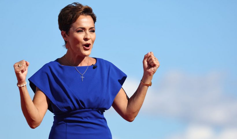 MESA, ARIZONA - OCTOBER 09: Arizona Republican nominee for governor Kari Lake speaks during a campaign rally attended by former U.S. President Donald Trump at Legacy Sports USA on October 09, 2022 in Mesa, Arizona. Trump was stumping for Arizona GOP candidates, including gubernatorial nominee Kari Lake, ahead of the midterm election on November 8. (Photo by Mario Tama/Getty Images)