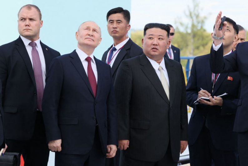 TOPSHOT - In this pool photo distributed by Sputnik agency, Russia's President Vladimir Putin (centre L) and North Korea's leader Kim Jong Un (centre R) visit the Vostochny Cosmodrome in Amur region on September 13, 2023. Russian President Vladimir Putin and North Korean leader Kim Jong Un both arrived at the Vostochny Cosmodrome in Russia's Far East, Russian news agencies reported on September 13, ahead of planned talks that could lead to a weapons deal. (Photo by Mikhail Metzel / POOL / AFP) (Photo by MIKHAIL METZEL/POOL/AFP via Getty Images)