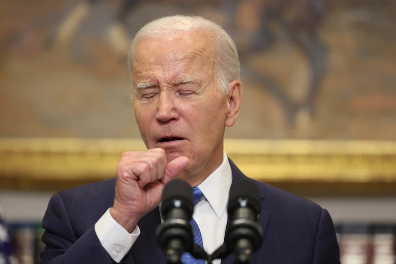 President Biden Speaks On The United Auto Workers Strike And Their Ongoing Contract Negotiations With The Big 3 Automakers
WASHINGTON, DC - SEPTEMBER 15: U.S. President Joe Biden coughs as he delivers remarks on the contract negotiations between the United Auto Workers and auto companies in the Roosevelt Room at the White House on September 15, 2023 in Washington, DC. The United Auto Workers authorized a strike for the first time since 2019 amid negotiations with Ford, General Motors and Stellantis. (Photo by Kevin Dietsch/Getty Images)