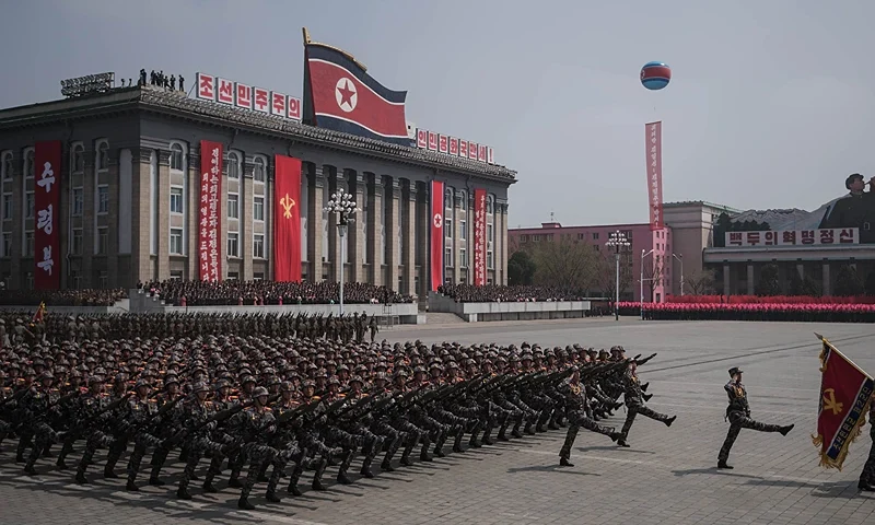 Korean People's Army (KPA) soldiers watch a military parade marking the 105th anniversary of the birth of late North Korean leader Kim Il-Sung, in Pyongyang on April 15, 2017. / AFP PHOTO / ED JONES (Photo credit should read ED JONES/AFP via Getty Images)