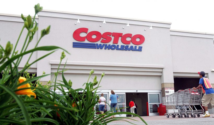MOUNT PROSPECT, IL - MAY 31: A worker pushes carts outside a Costco Wholesale store May 31, 2006 in Mount Prospect, Illinois. Third-quarter earnings reported today were up at Costco, the nation's largest warehouse club operator, although current oil prices affected margins at their associated gas stations. (Photo by Tim Boyle/Getty Images)