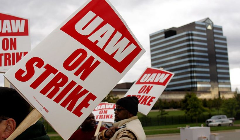 AUBURN HILLS MI - OCTOBER 10: United Auto Workers members walk off the job and picket at the Chrysler LLC world headquarters after the UAW and Chrysler LLC failed to reach a tentative contract agreement by an 11am UAW strike-imposed deadline October 10, 2007 in Auburn Hills, Michigan. (Photo by Bill Pugliano/Getty Images)