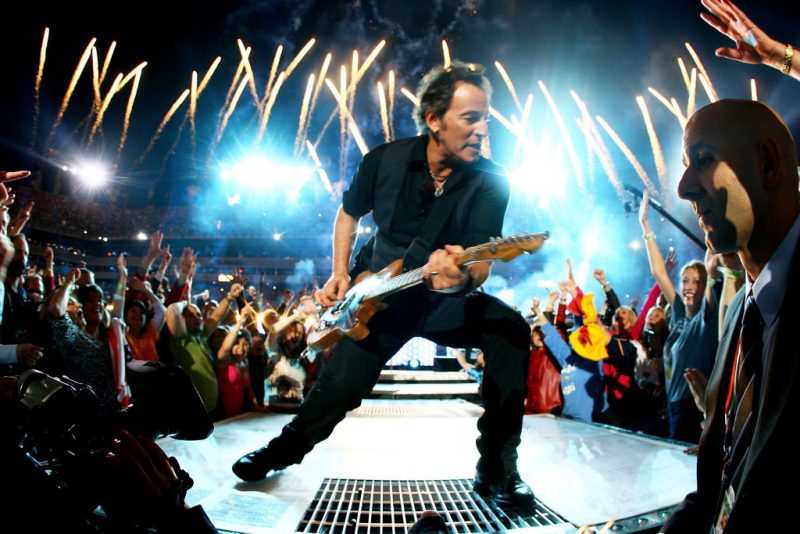 TAMPA, FL - FEBRUARY 01: Musician Bruce Springsteen and the E Street Band perform at the Bridgestone halftime show during Super Bowl XLIII between the Arizona Cardinals and the Pittsburgh Steelers on February 1, 2009 at Raymond James Stadium in Tampa, Florida. (Photo by Jamie Squire/Getty Images)