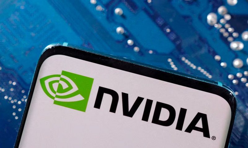 A smartphone with a displayed NVIDIA logo is placed on a computer motherboard in this illustration taken March 6, 2023. REUTERS/Dado Ruvic/Illustration/File Photo
