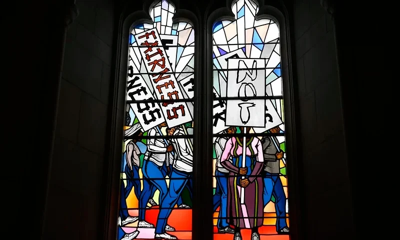 Light shines through new stained-glass windows with a theme of racial justice during a ceremony at the Washington National Cathedral for the windows on Sept. 23, 2023. (Photo via; AP Photo/Nick Wass)