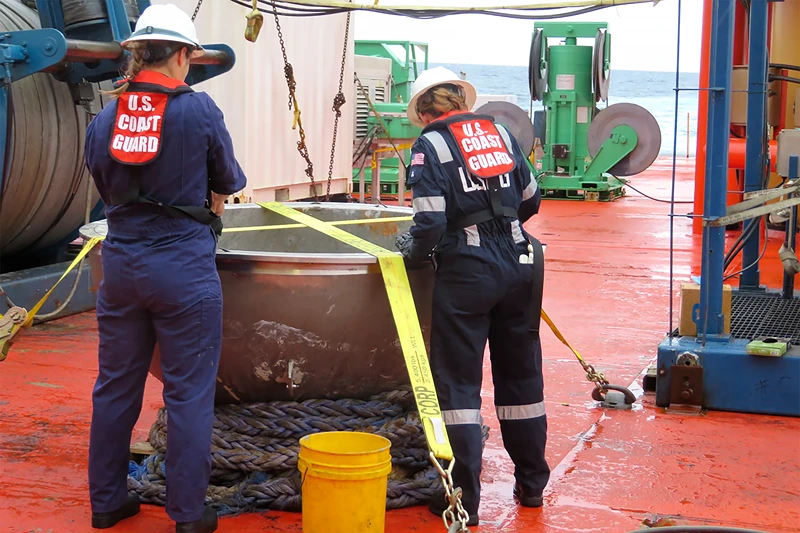 Titan Tourist Sub
In this photo provided by the U.S. National Transportation Safety Board, U.S. Coast Guard marine safety engineers assigned to the Marine Safety Center in Washington D.C., working for the Marine Board of Investigation for the Titan submersible case, conduct a survey of the aft titanium endcap from the Titan submersible, in the North Atlantic Ocean, Sunday, Oct. 1, 2023. The endcap was recently recovered from the seafloor and successfully transferred to a U.S. port for analysis. (U.S. National Transportation Safety Board via AP)