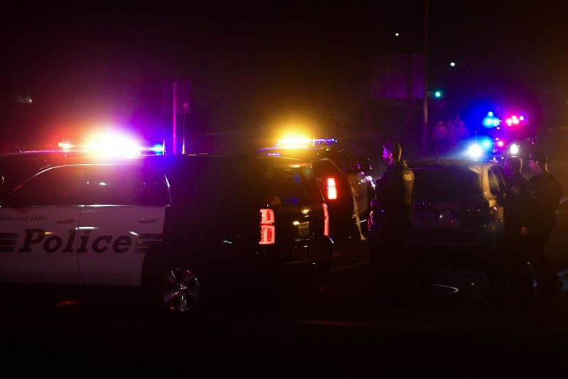 TOPSHOT - Police officers are seen at the intersection of US 101 freeway and the Moorpark Rad exit as police vehicles close off the area responding to a shooting at a bar in Thousand Oaks, California on November 8, 2018. - Twelve people, including a police sergeant, were shot dead in a shooting at a nighttclub close to Los Angeles, police said Thursday. All the victims were killed inside the bar in the suburb of Thousand Oaks late on Wednesday, including the officer who had been called to the scene, Sheriff Geoff Dean told reporters. The gunman was also dead at the scene, Dean added. The bar was hosting a college country music night. (Photo by Frederic J. BROWN / AFP) (Photo credit should read FREDERIC J. BROWN/AFP via Getty Images)